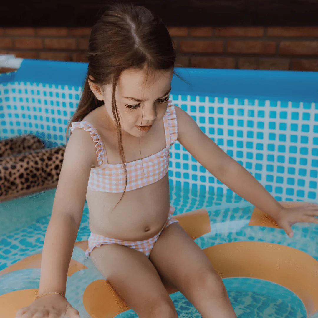 Sunset Grid – Bikini con protezione UV per bambina | Arancione/Bianco