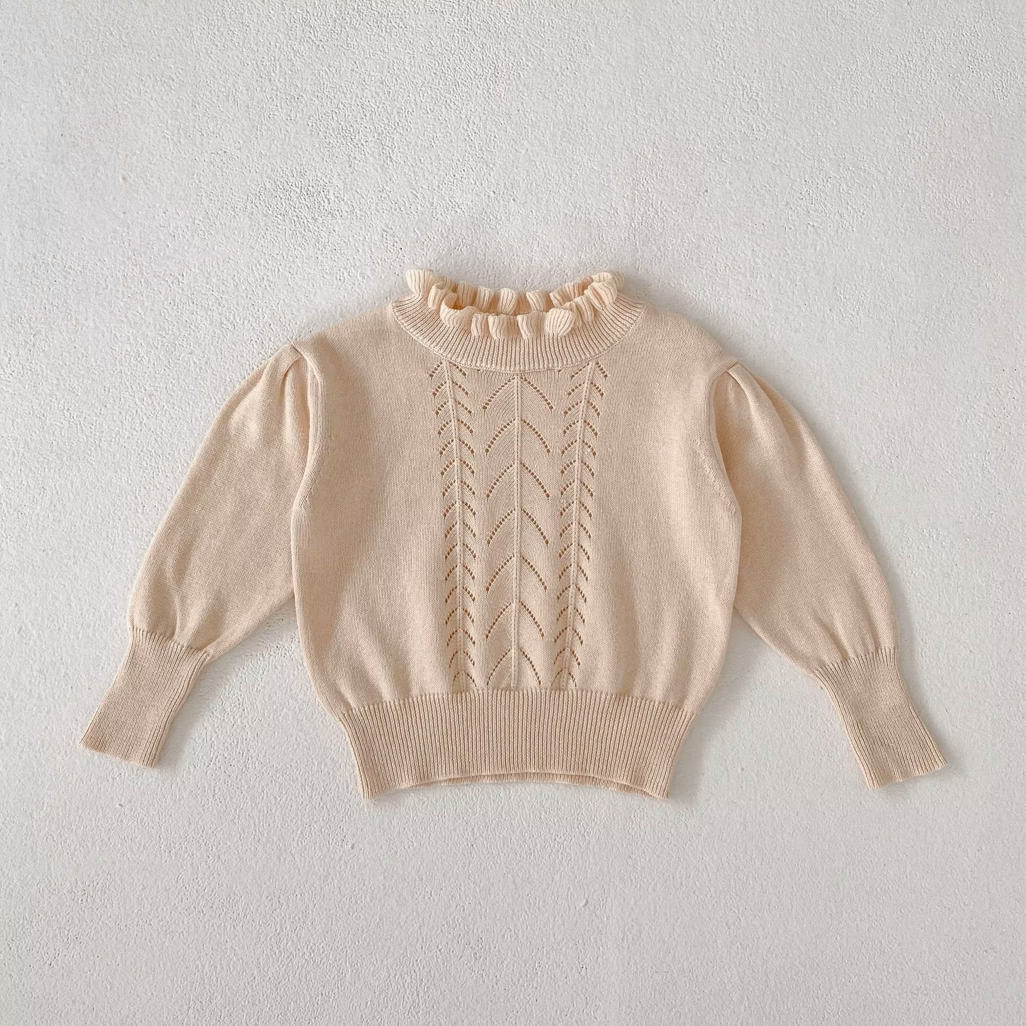 Pullover in cotone con rouches sul colletto